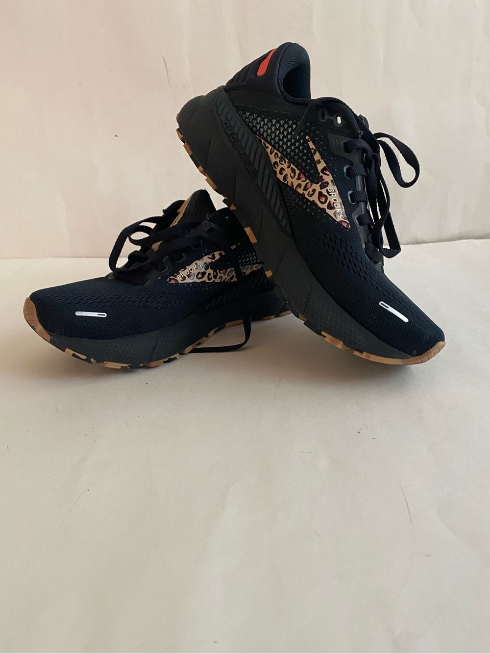 Brooks Women's Sneakers in Black with Leopard Accent